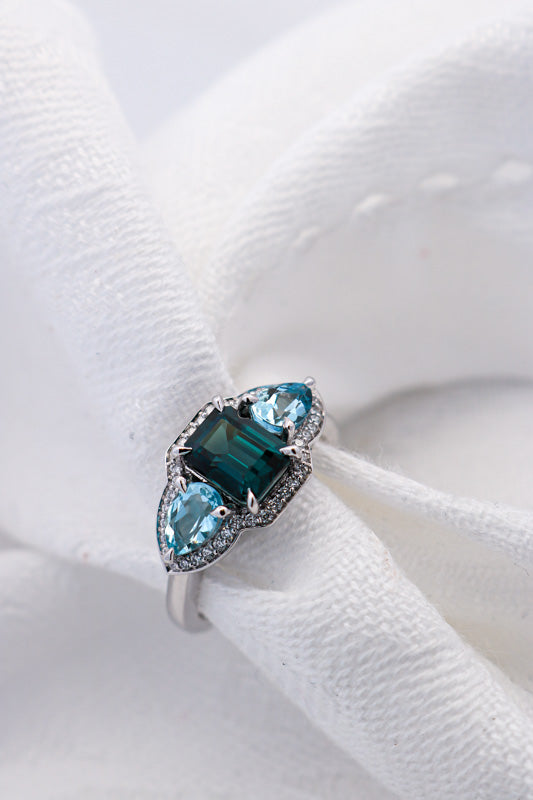 Blue Gemstone Ring with white diamonds and white gold