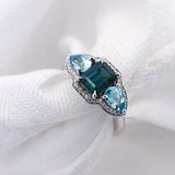 Blue Gemstone Ring with white diamonds and white gold | McLean & Co Jewellers Sunshine Coast