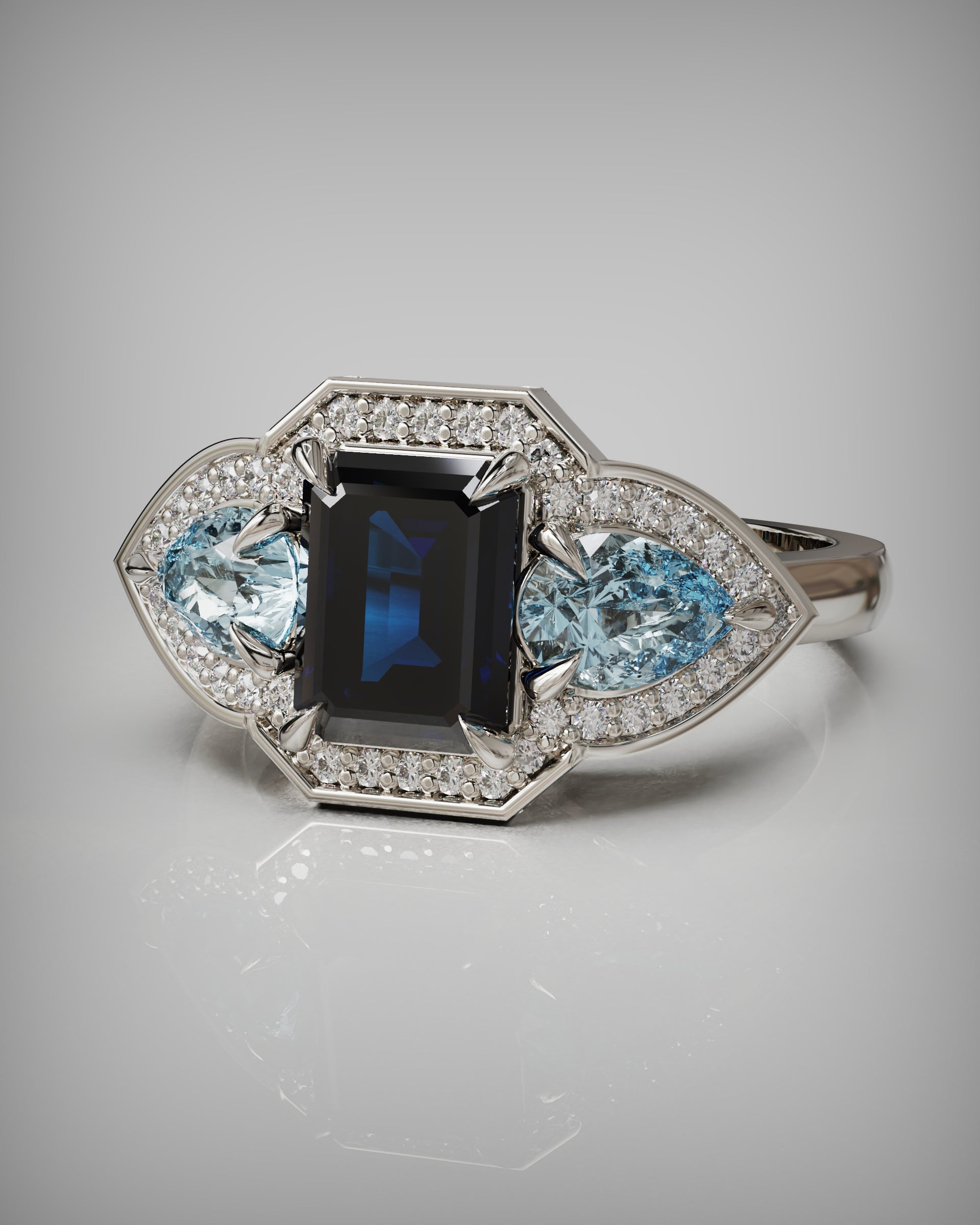 Blue Sapphire and Aquamarine Gemstone ring set with white diamonds surrounding the gems in white gold