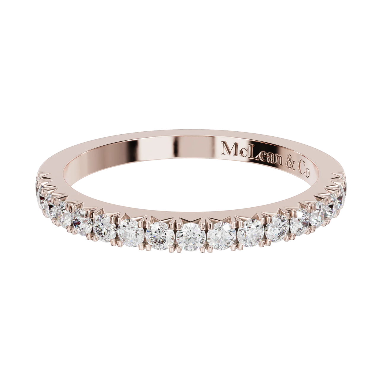 Rose gold ring with diamonds on a white background