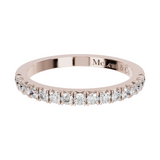 Rose gold ring with diamonds on a white background