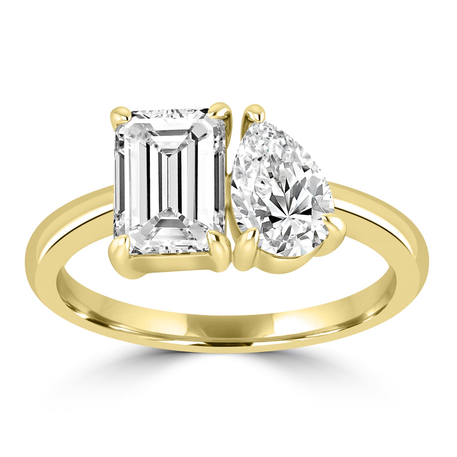 Emerald Cut Diamond and Pear Cut Diamond in Yellow Gold Setting