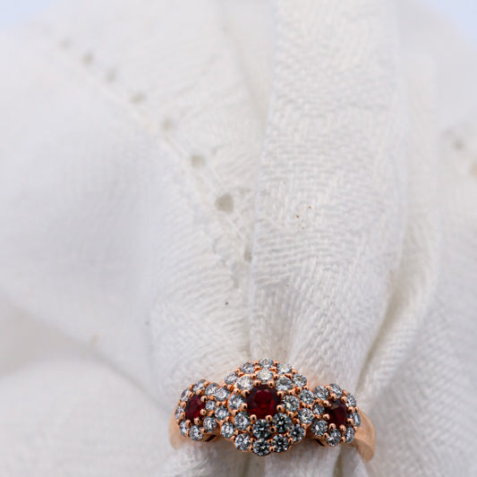 3 Red Round Rubies Halo Diamond Ring set in Rose Gold | McLean & Co Jewellers Sunshine Coast 