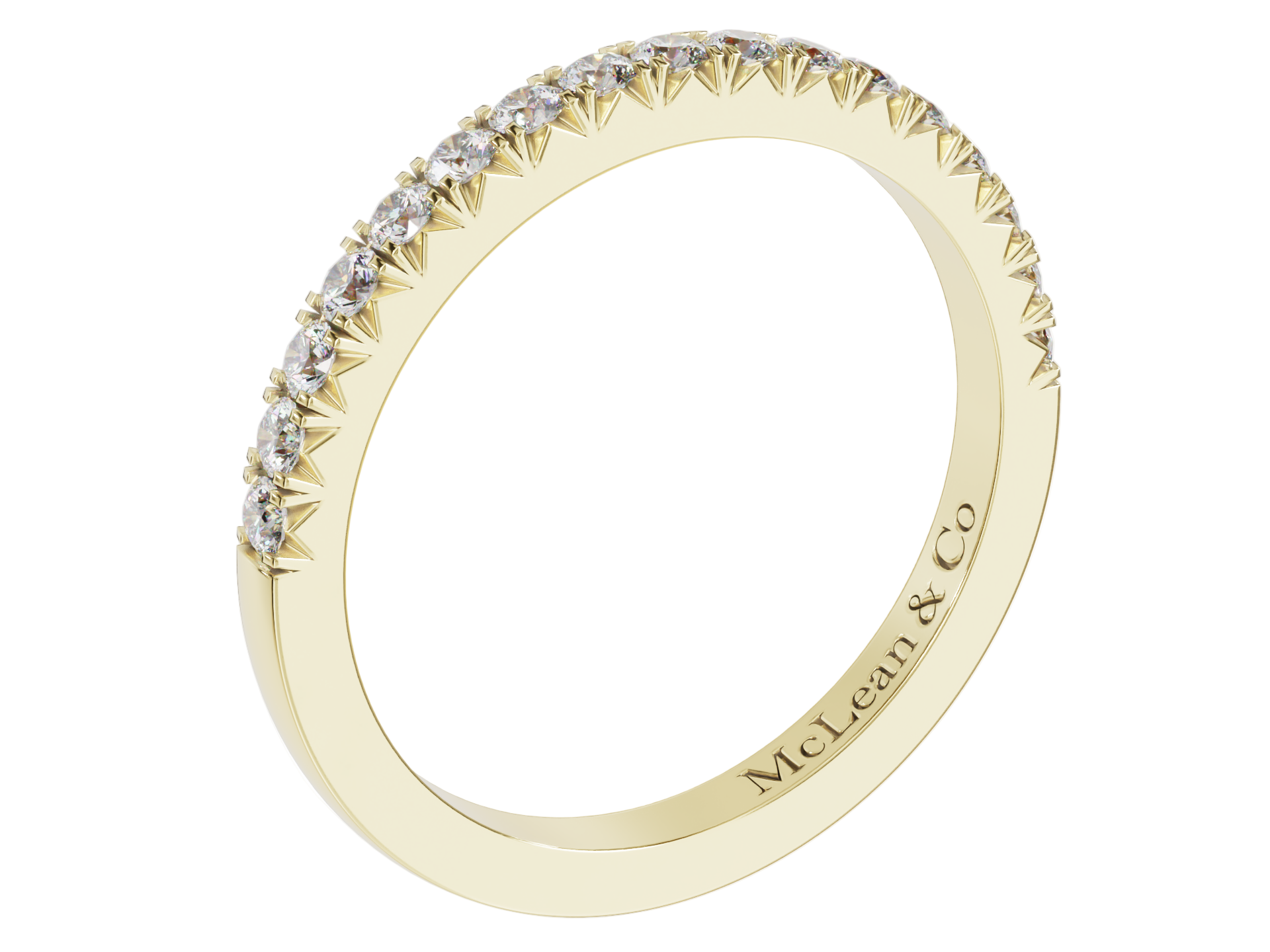 A yellow gold diamond wedding stacker band with multiple stones set around the circumference.