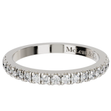 platinum ring with embedded diamonds on a white background