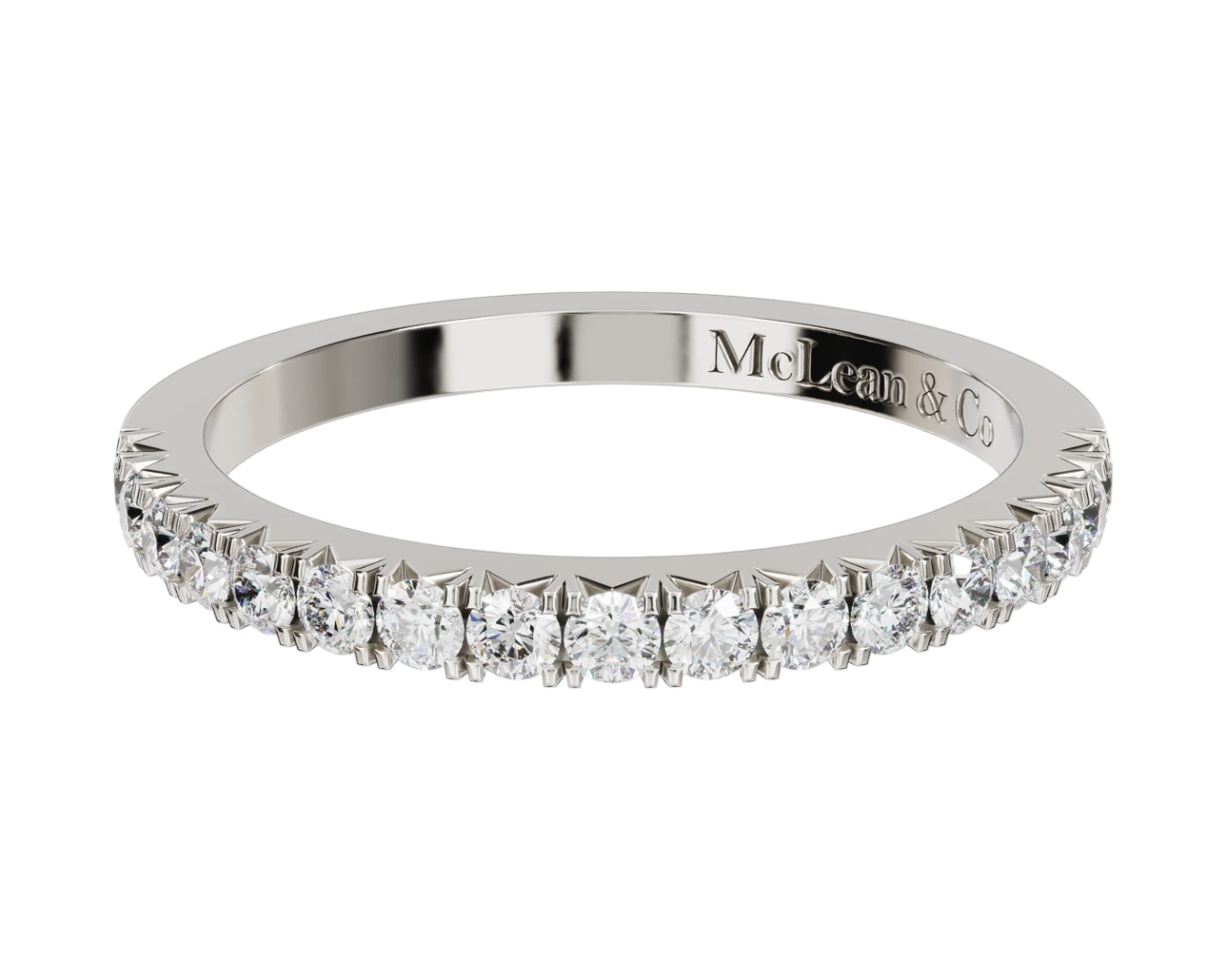 Diamond ring with 'McLean & Co' engraving on a white background