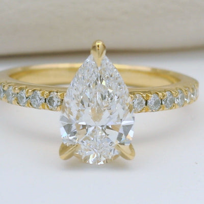 Pear Shape Diamond Ring in Yellow Gold with Shoulder stones 