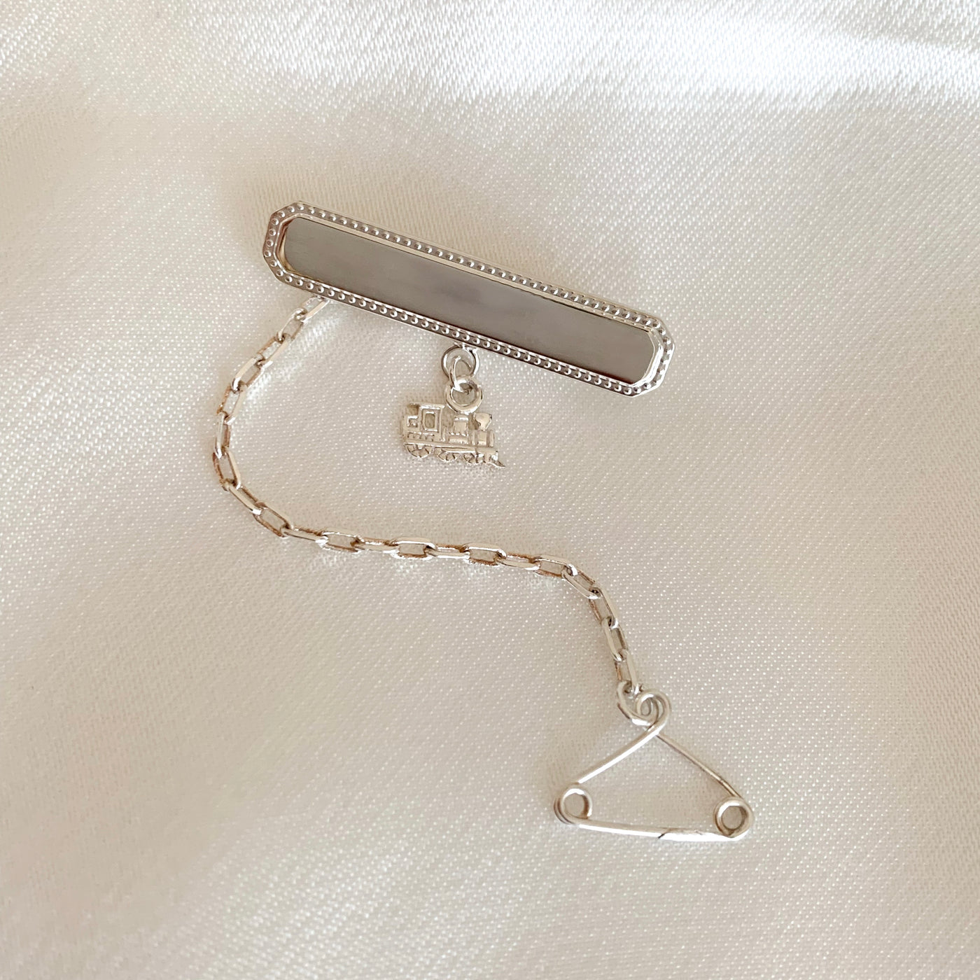 Baby Brooch With Train Drop