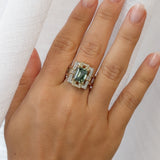 beautiful green gemstone ring on hand
