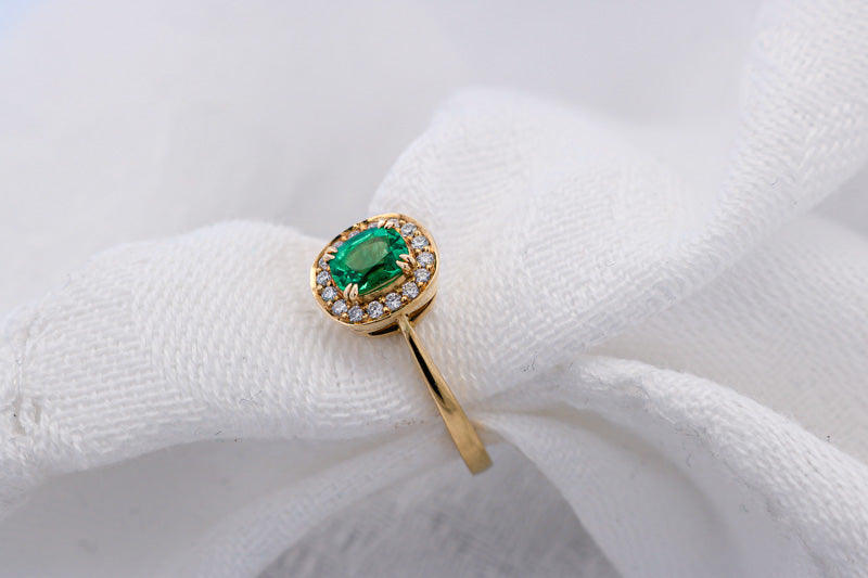 emerald halo yellow gold ring