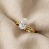 pear cut yellow gold engagement ring 
