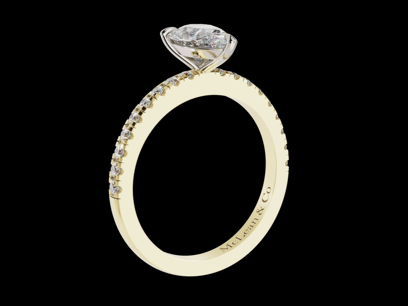 pear shape diamond engagement ring in yellow gold with shoulder stones side view