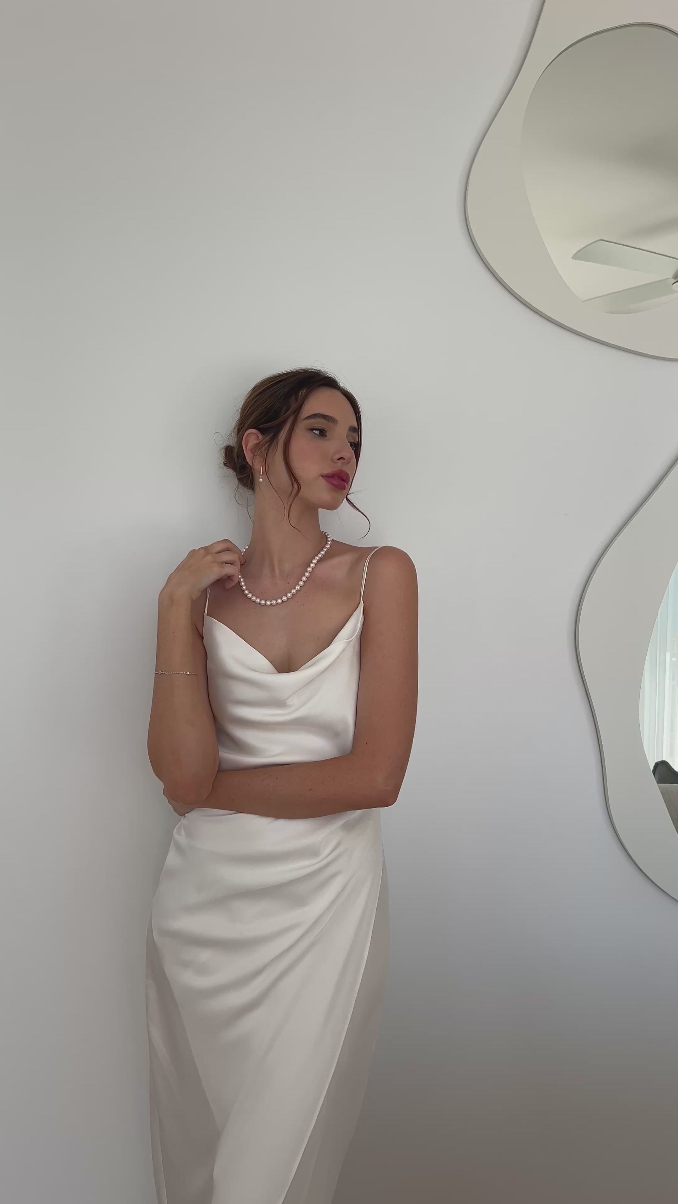 Model wearing akoya pearl strand