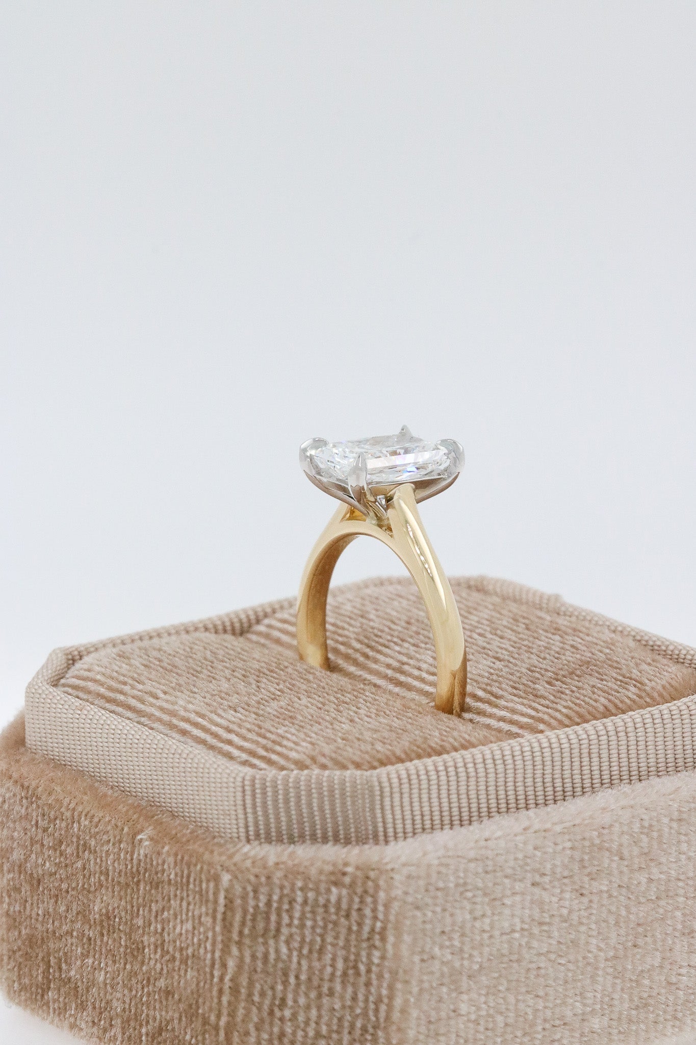 side view radiant cut lab grown diamond engagement ring with 4 claw 